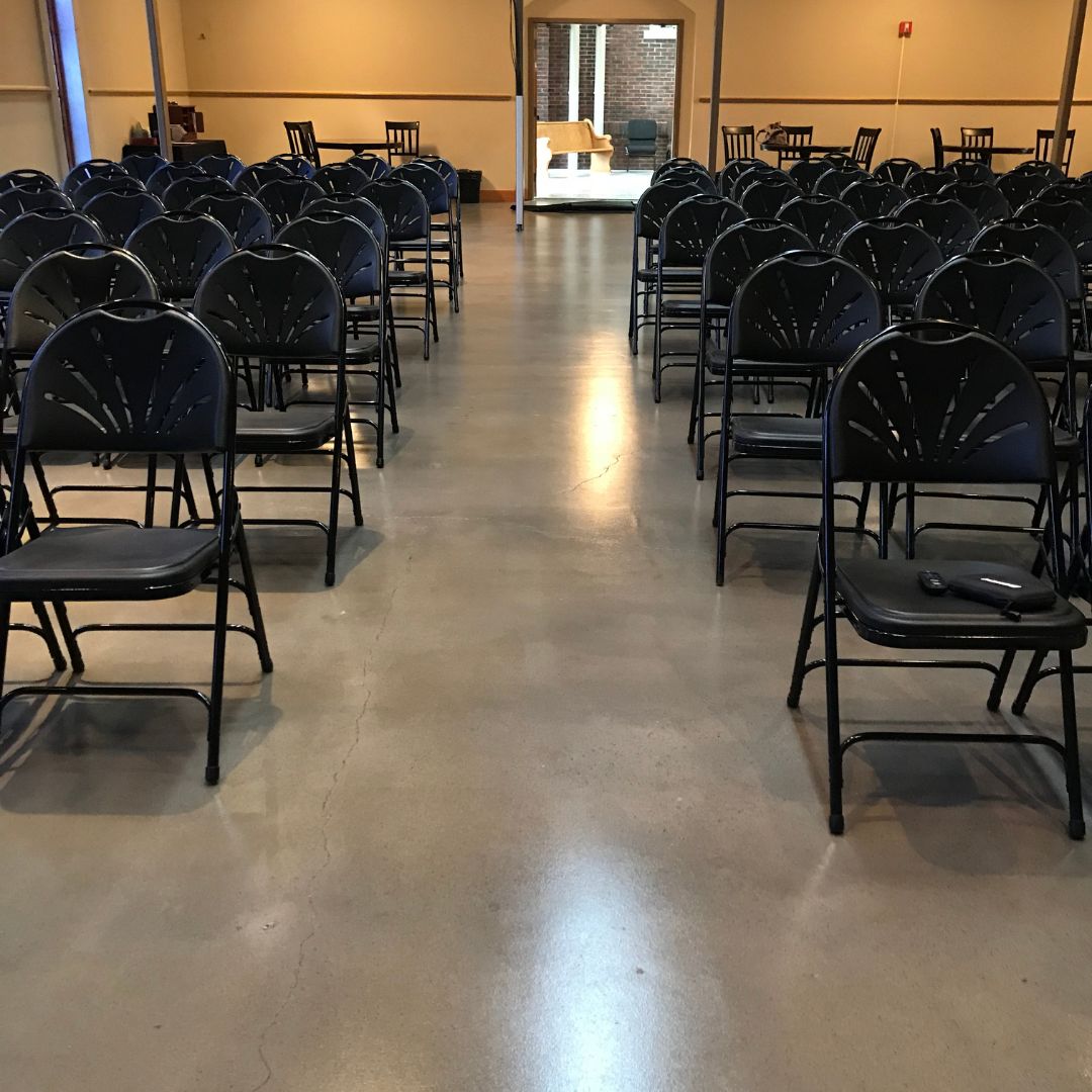 commercial and residential epoxy floor concrete coating in Piqua Locker Room Concrete Coating Circle Image